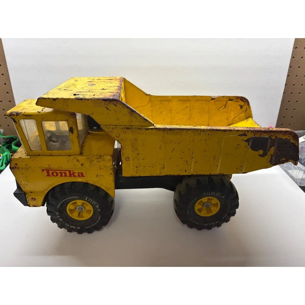 Vintage 1970s Mighty Tonka Dump Truck XMB-975 Pressed Steel Yellow Heavy Duty